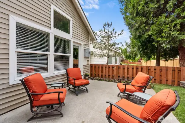 Meticulously landscaped and fully fenced for both beauty and privacy
