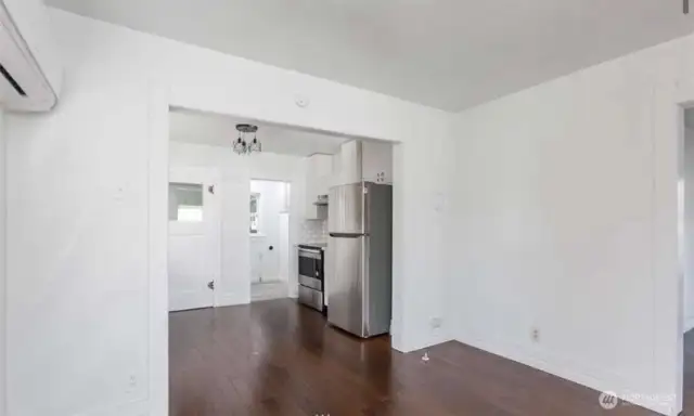 from dining room looking into kitchen and laundry