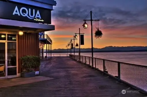 Dine at the Iconic Aqua for happy hour while taking the sunsets.