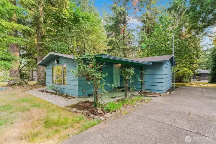 Cozy 1 bedroom home and 3 car garage/shop .