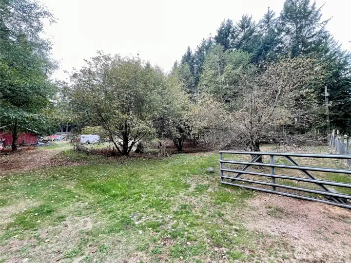 Entrance to property from 253rd showing Barn and Pasture area