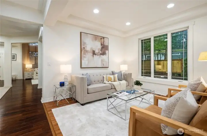 Open floor plan peeks into great room and kitchen beyond.