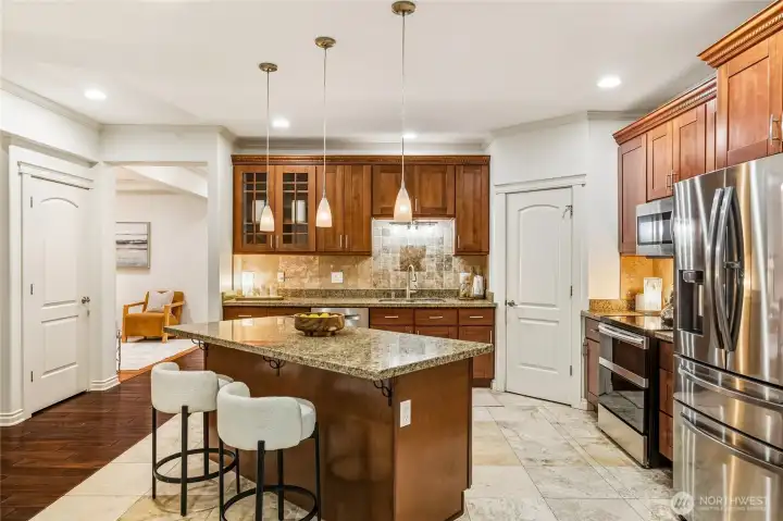 Stainless steel appliances and a unique open design keeps the chef at the center of the party!