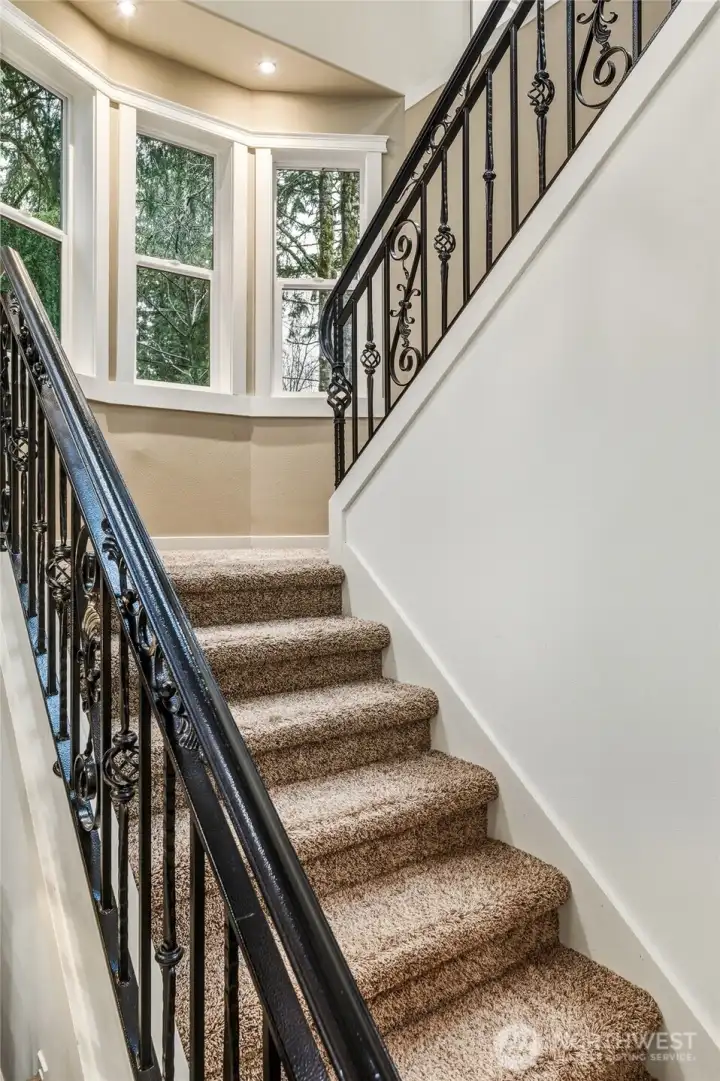 Custom wrought iron details adds a touch of elegance.