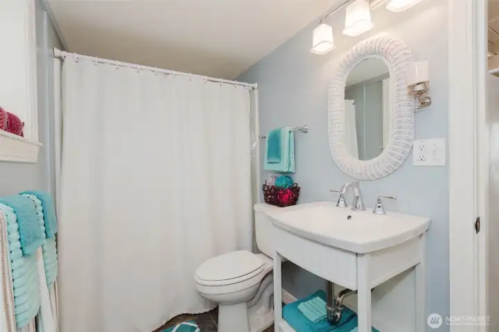 Bathroom with full tub and shower