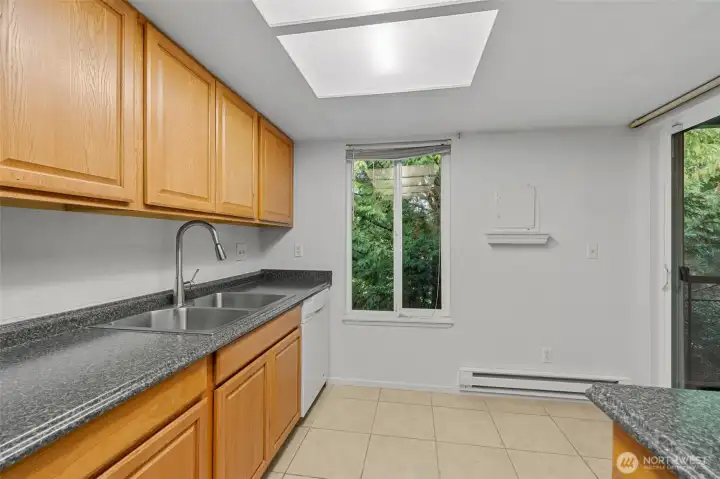 Another slider door leading to your balcony from your kitchen. Grab your morning coffee and enjoy it on your balcony