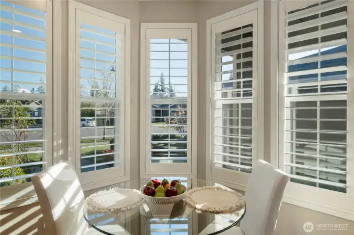 Great wood shutters in the breakfast nook