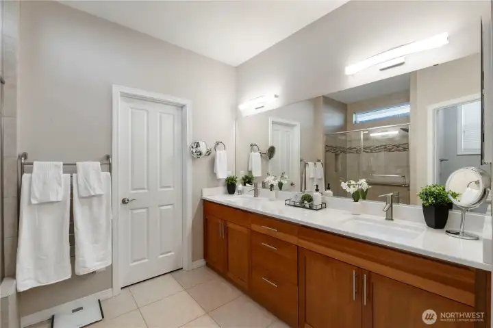 Large primary bathroom with double sinks.
