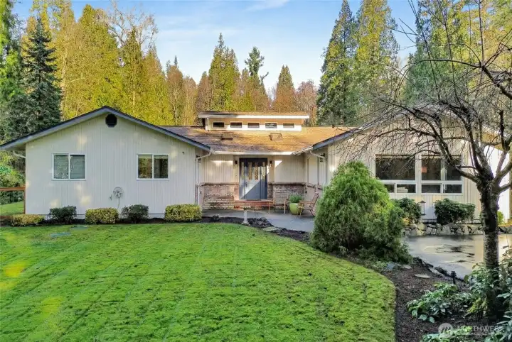Courtyard entry. Furniture virtually staged.