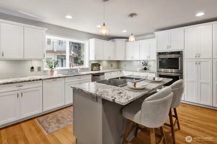 Eating bar. Double Ovens. Large pantry cupboards.