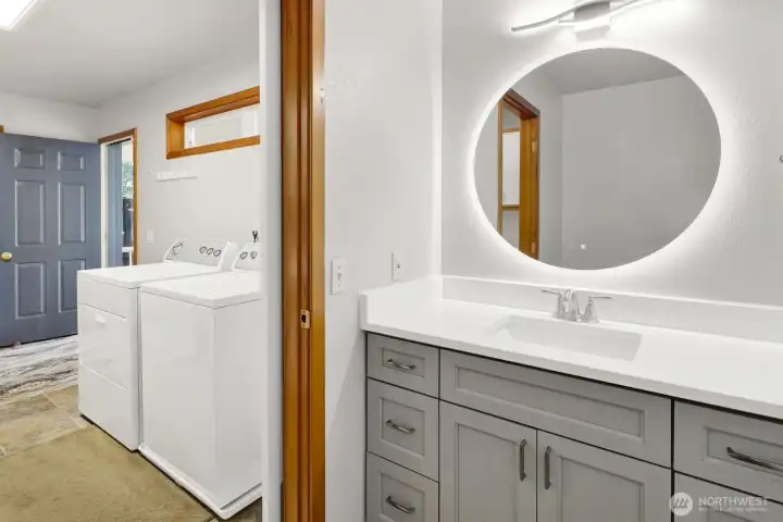 Half bath off utility mud room.