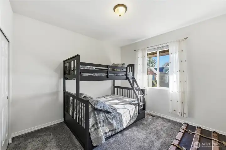 The guest bedroom is adjacent to the updated full bath.