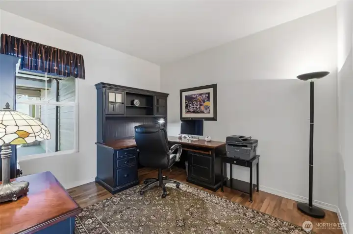 The home office separates the 2 bedroom wings and creates privacy for both spaces.