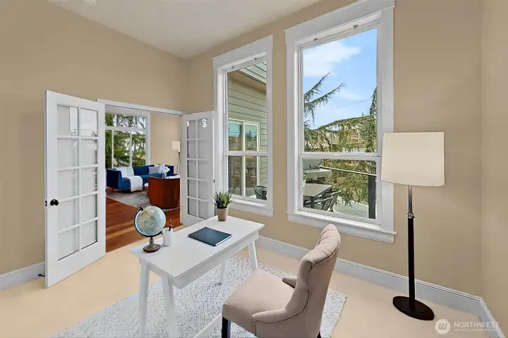 This bedroom/office is located on the main off of the family room.  There is a closet with built-in storage and the 3/4 bathroom can be accessed directly from this room.