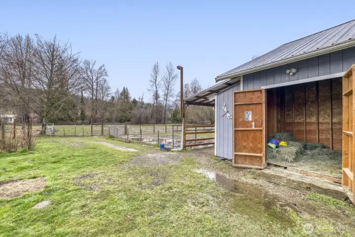 Side garage with hay storage