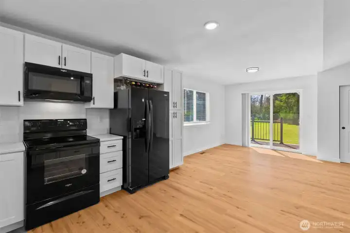 Brand new appliances, and wine rack installed above fridge!