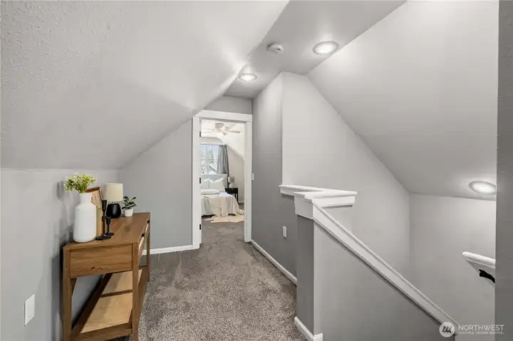 2nd floor landing with extra space for a nook.