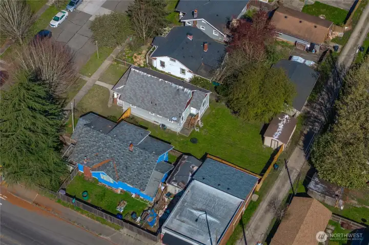 Prime lot with alley access and detached garage/shed. Great location for future development (DADU anyone?)