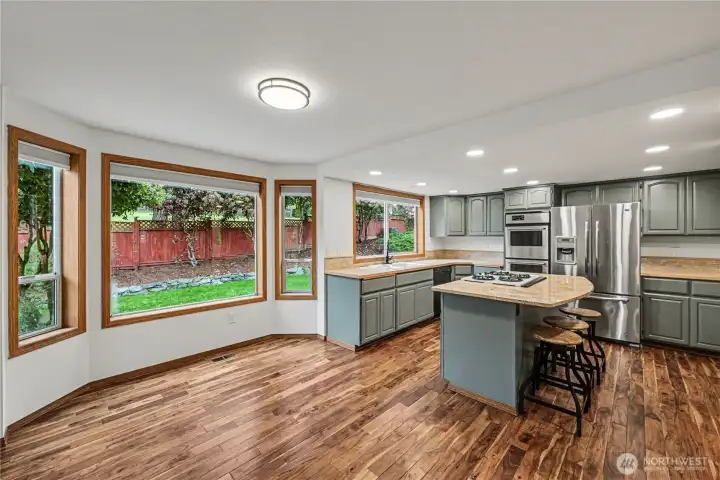 Open breakfast nook offering a casual dining space filled with natural light.
