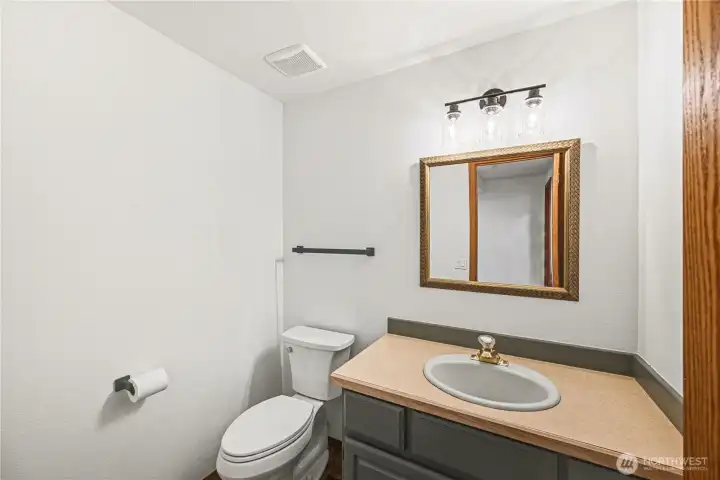 Downstairs half bathroom.