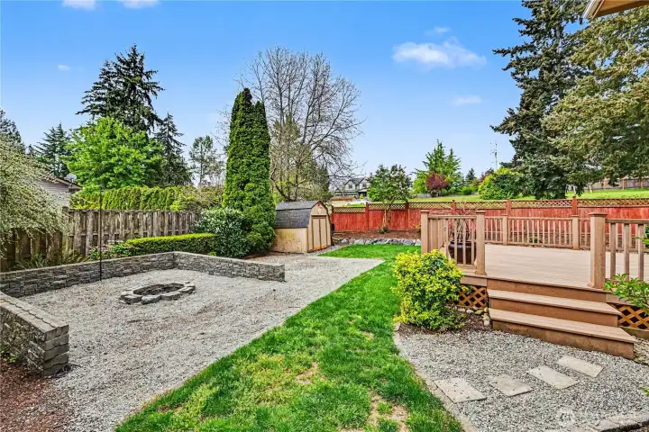 Generous fire pit area designed for outdoor enjoyment and entertaining.