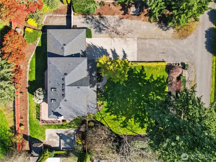 Stunning aerial perspective highlighting the property’s setting and layout.