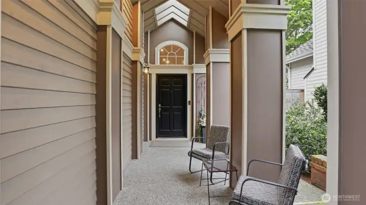 A tall covered porch that t keeps you dry for any amount of rain.  There is the perfect 3 car garage with metal doors. A short walk to Klahanie pool, Parks, sporting courts and so much more.