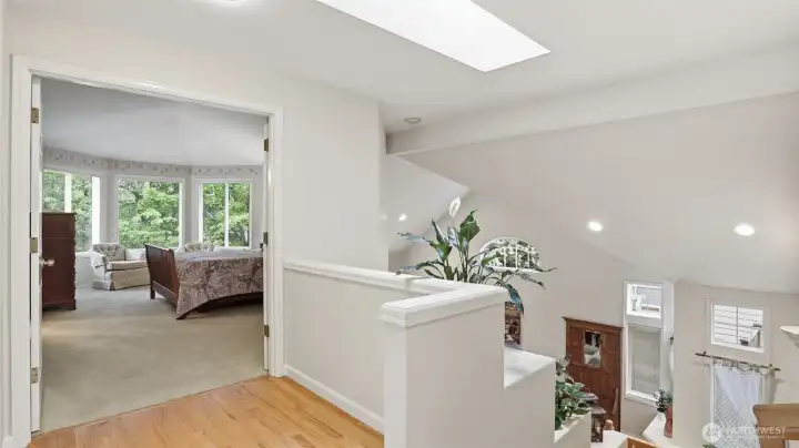 Double doors to the primary suite and very special views into the backyard.