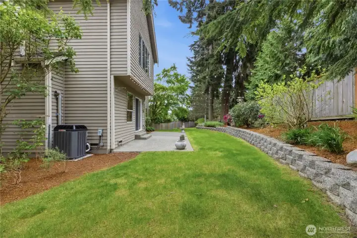 Large Backyard with Mature Landscaping and Garden Space