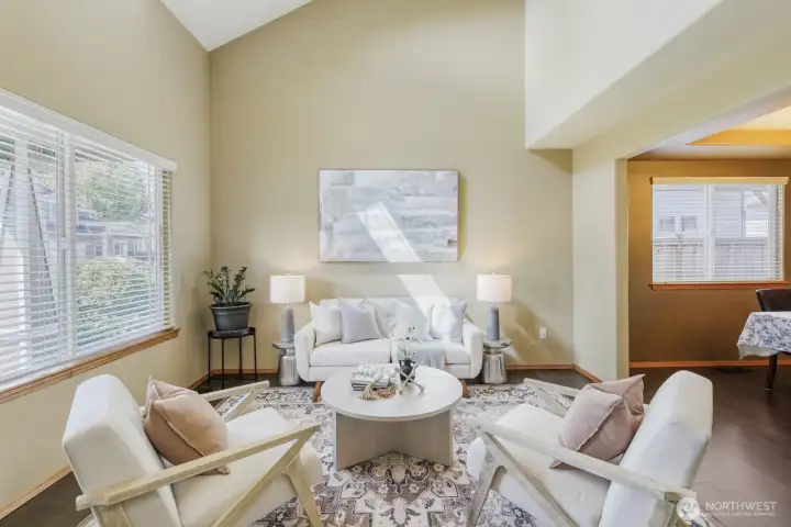 SPACIOUS LIVING ROOM WITH VAULTED CEILINGS AND OPEN LAYOUT.  PERFECT FOR RELAXING OR ENTERTAINING GUESTS.