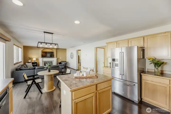 ATTRACTIVE KITCHEN WITH EASY ACCESS TO LIVING ROOM FOR RELAXING AND ENTERTAINING.