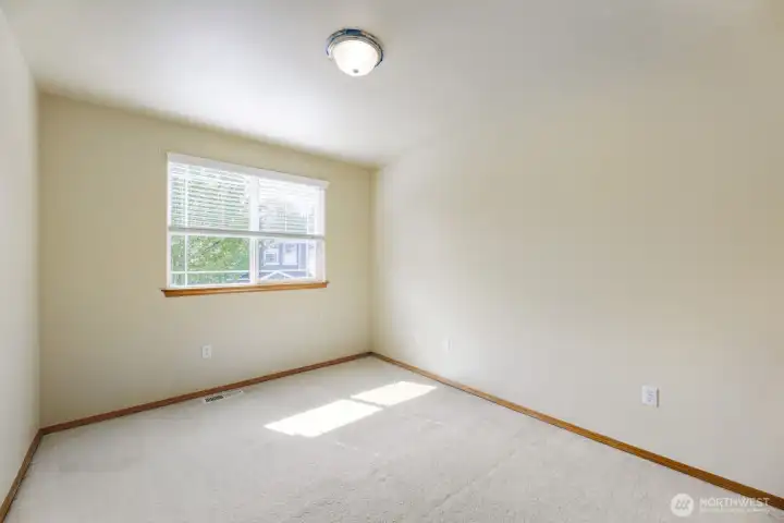 RELAXING FOURTH BEDROOM UPSTAIRS GIVES THAT EXTRA SPACE NEEDED.