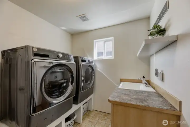 USEFUL UTILITY ROOM DOWNSTAIRS W/WASHER/DRYER UPSTAIRS– ALL APPLIANCES COME W/ THE HOME!
