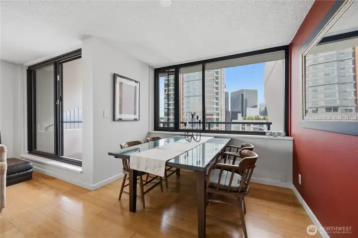 Here's another look at the spacious dining area & you can see the deck slider door access to relax & enjoy!