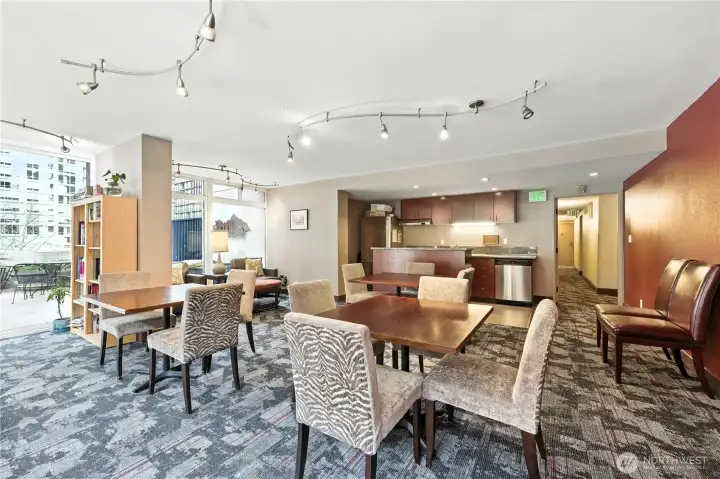 Another photo of this wonderful club/party room which leads out to the outdoor pool, patio seating, BBQ's & firepit.