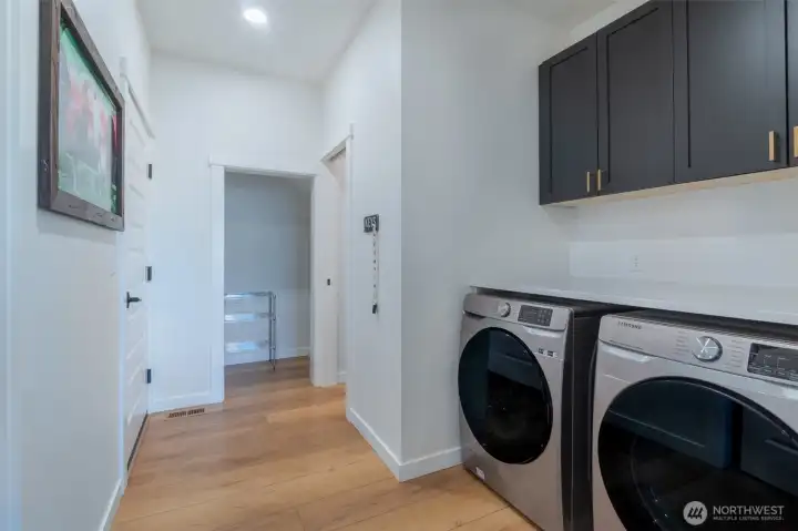 Laundry/utility room leading into garage
