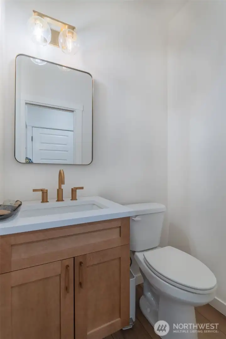 half bath off of kitchen/utility room
