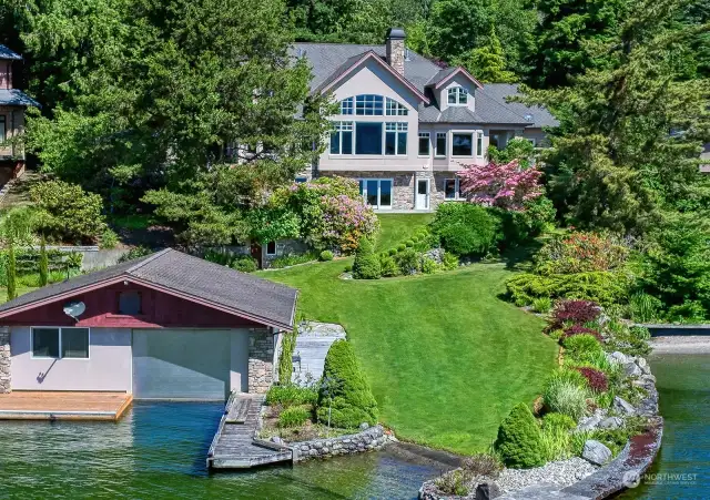The epitome of luxury lake living! Gorgeous and meticulously built.