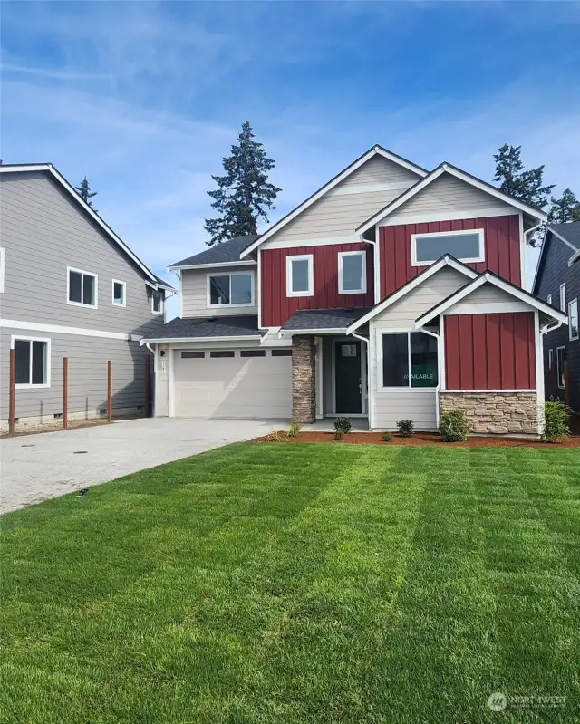 This Odyssey home features an extra long driveway and beautiful curb appeal!