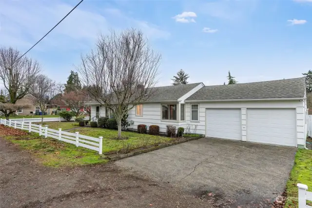 Oversized 2 car garage with workshop area in the back.