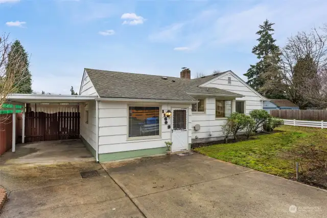 Carport is on the other size of the home, near the family room entrance.