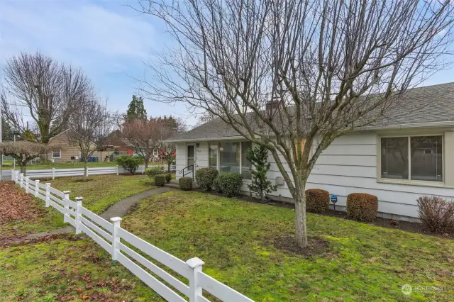 Front yard with cute white picket fence.