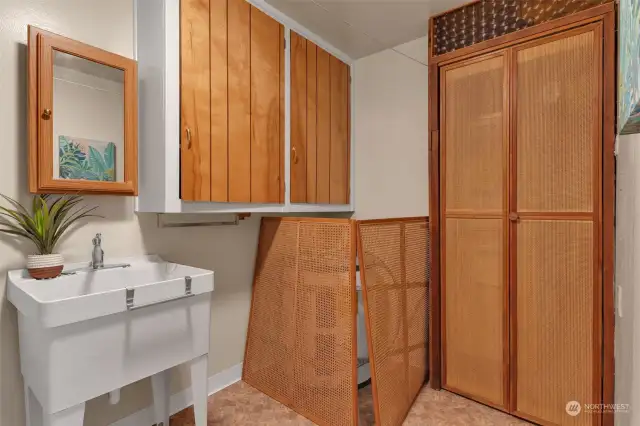 Laundry room with utility sink.