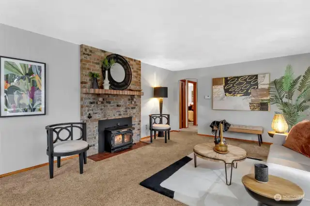 Living room with wood burning insert.