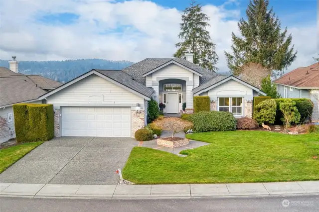 The cathedral style entrance with sweeping views from doorway to back deck are breathtaking! With all the new built in amenities this is such a low maintenance home for anyone to enjoy.