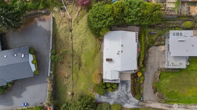 Vacant lot in the heart of Lake Forest Park, just two blocks from Lake Washington.  Lot is sloped and will allow for maximum lake views once developed.