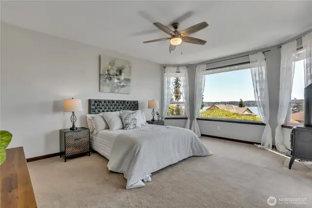 Nice primary suite with bay window and 2 walk in closets.