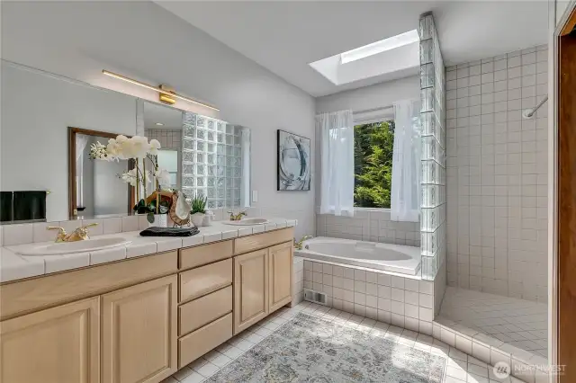 5 piece primary bath with spacious shower.