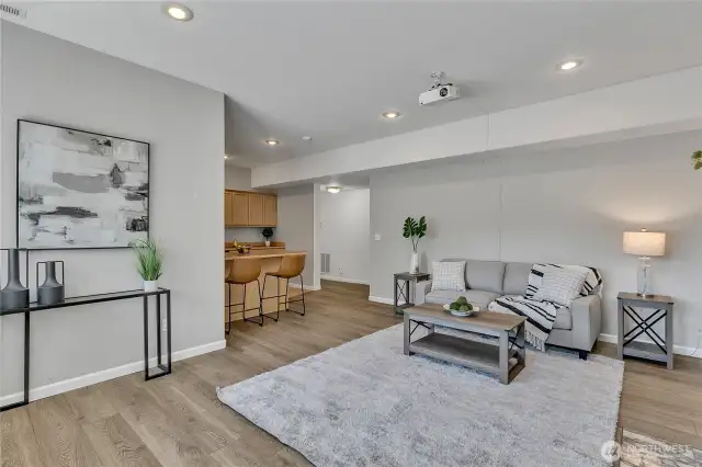 Comfortable & lovely family/game/movie room. Projector & big screen too!