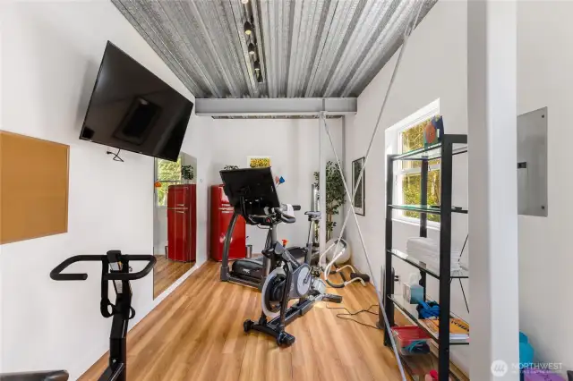 Don't miss the gym! On your left as you head down the stairs towards the front door of the home.